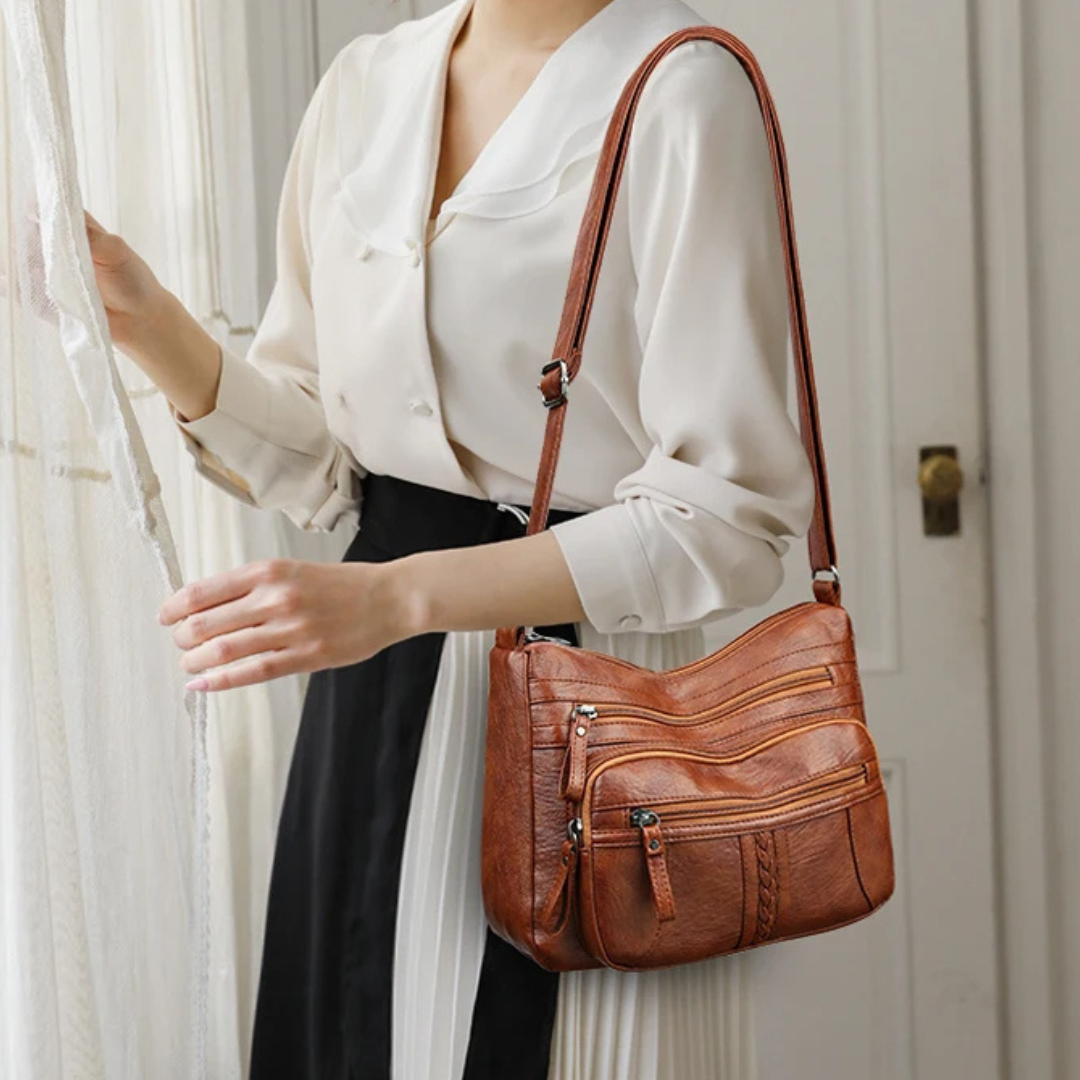 Le sac en bandoulière cuir tyni