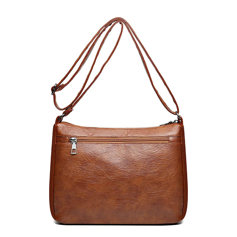 Le sac en bandoulière cuir tyni