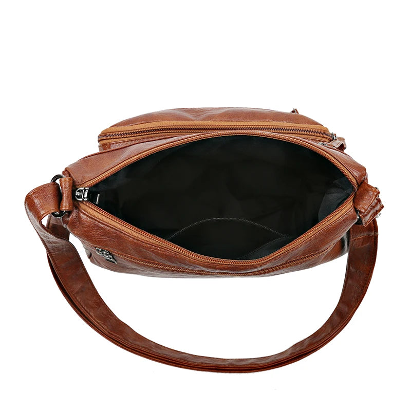 Le sac en bandoulière cuir tyni